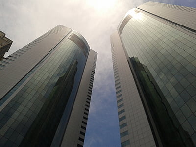 low-angle photography of high rise buildings thumbnail