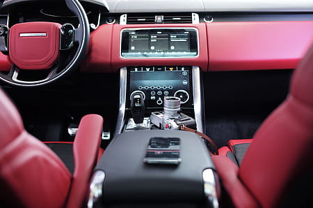 black smartphone on top of car center console thumbnail