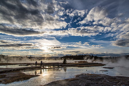 body of water under cloudy sky thumbnail