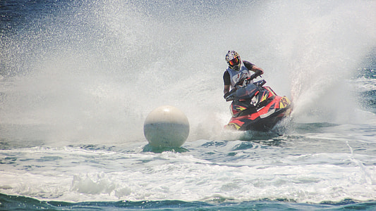 man riding personal watercraft at daytime thumbnail