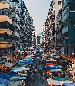 photography of stalls near buildings thumbnail