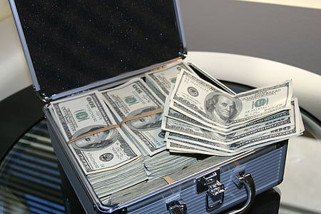 100 US dollar bundles in case thumbnail