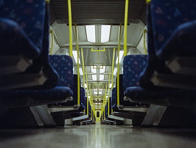 shallow focus photography of blue and gray train interior thumbnail