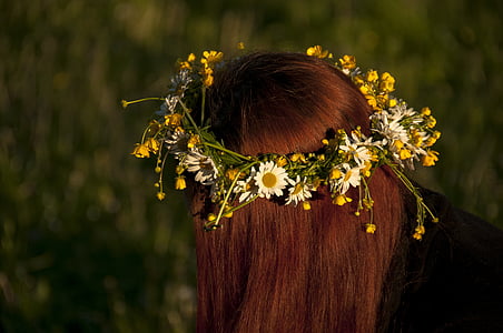 woman wearing yellow ox-eyed daisy headress thumbnail