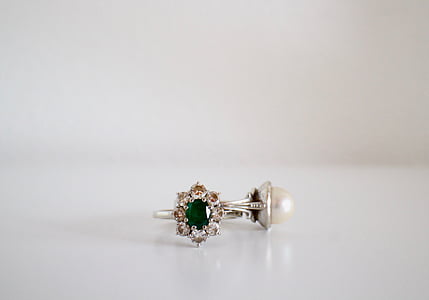pair of gold-colored earrings thumbnail