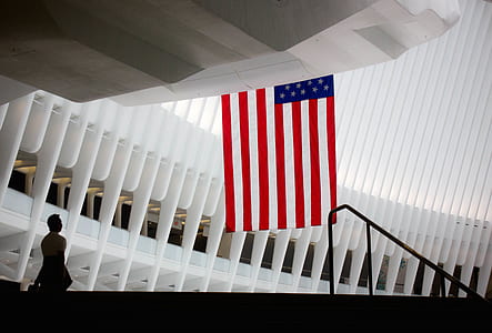 person in front of flag of U.S.A. thumbnail