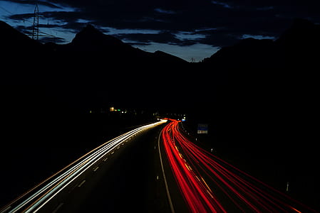 time-lapsed photography of highway with full of vehicles thumbnail