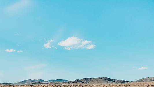 mountain under white clouds thumbnail