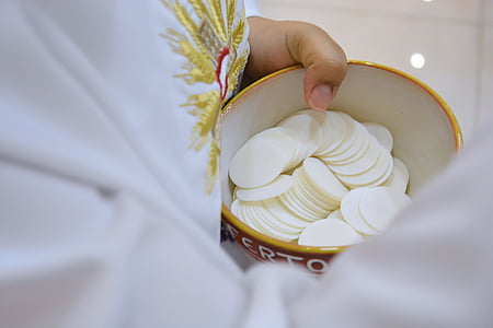 selective focus of holy host in bowl thumbnail