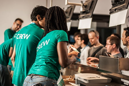 man and woman wearing teal shirts thumbnail