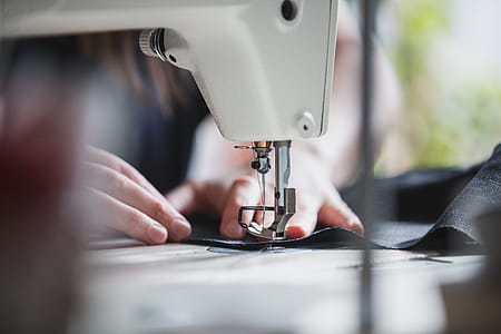 Hands Sewing Fabric Photo thumbnail