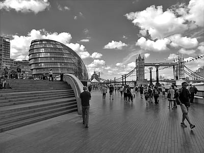 Grayscale Photo of People Walking Near Tower Bridge at London thumbnail