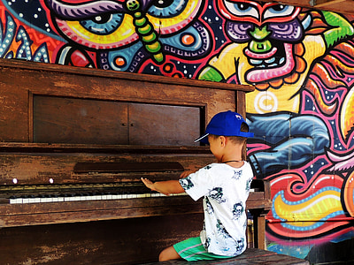 boy using piano thumbnail