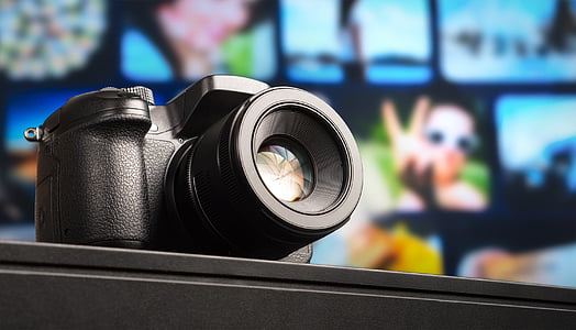 selective focus of black DSLR camera thumbnail