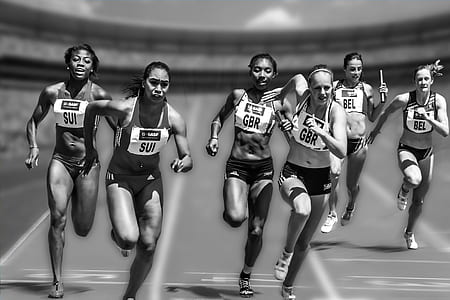 six women running on field during daytime thumbnail