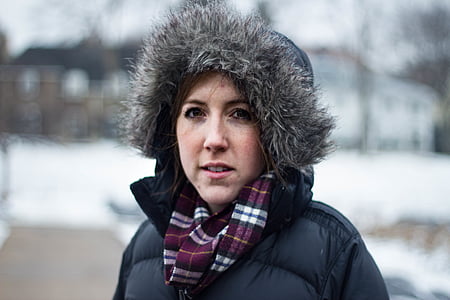 women's black and gray parka jacket in selective focus photography thumbnail