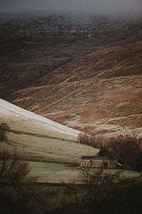 landscape photography of house beneath mountain thumbnail