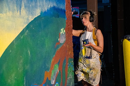 Woman Wearing Black Headphones Painting thumbnail