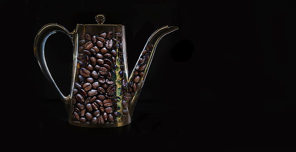 pitcher filled with coffee beans thumbnail