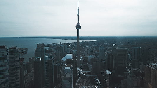 photo of TV tower under clear sky thumbnail