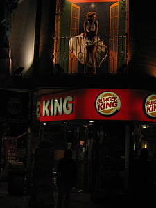 person standing at the front of Burger King store thumbnail