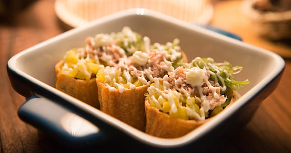 Three Tacos on Black And White Ceramic Bowl thumbnail