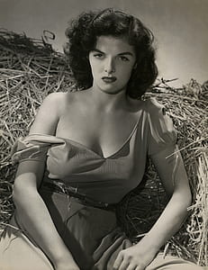 woman sitting on hay thumbnail