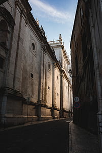 gray buildings under the blue sky thumbnail