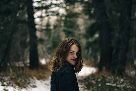 photo of woman looking at camera at forest thumbnail