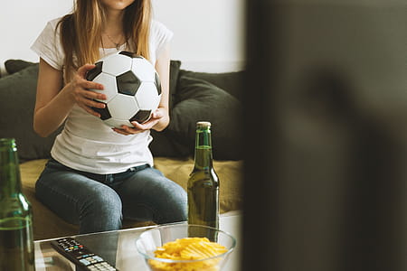Girl watching soccer match thumbnail