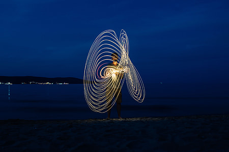 Light painting on the beach at nigh thumbnail
