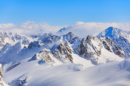 snow cap mountain during daytime thumbnail