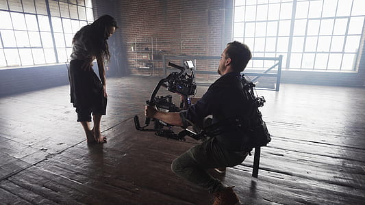 man filming woman thumbnail