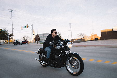 man riding on motorcycle thumbnail