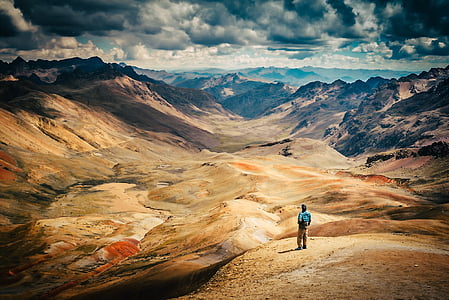 man standing on cliff thumbnail