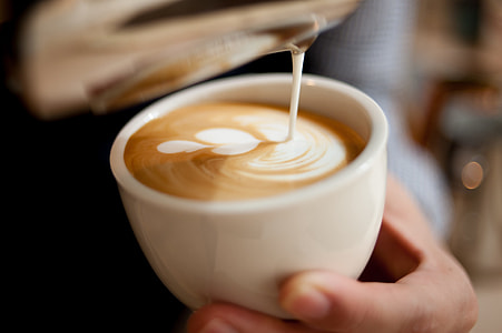 person doing latte art thumbnail