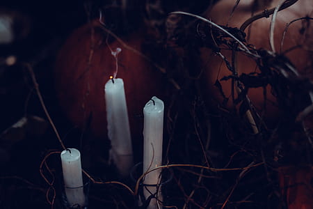three unlighted candles thumbnail