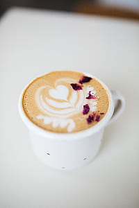 white ceramic cup with cappuccino thumbnail