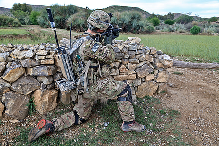 soldier holding assault rifle thumbnail