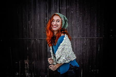 Woman in Blue Shirt an White Scarf With Red Hair thumbnail