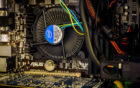brown and white Asus computer motherboard thumbnail