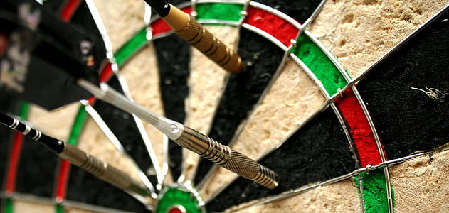 three dart pins on dartboard thumbnail