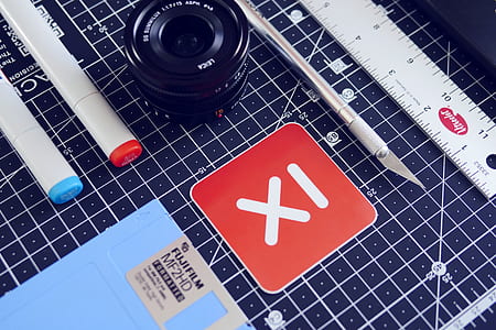 black DSLR camera lens thumbnail