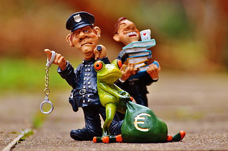 police office with red eyed tree frog figurines thumbnail