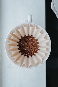 round pastry on white mug thumbnail