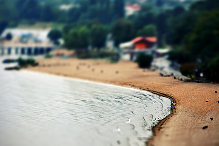 photo of body of water near green leafed trees thumbnail