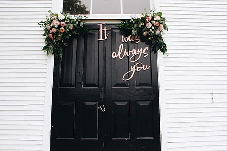 black wooden door with white wall thumbnail
