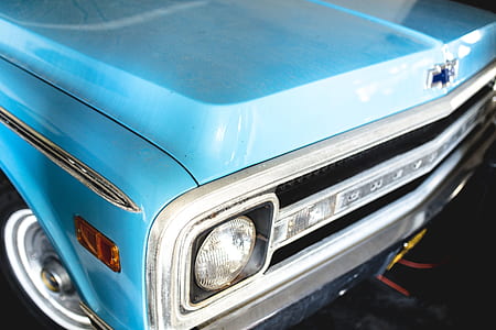 focus photo of blue Chevrolet headlight thumbnail