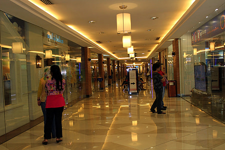 people near glass wall thumbnail