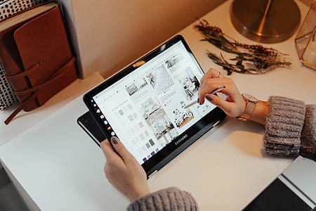 person holding Samsung Galaxy Tab thumbnail